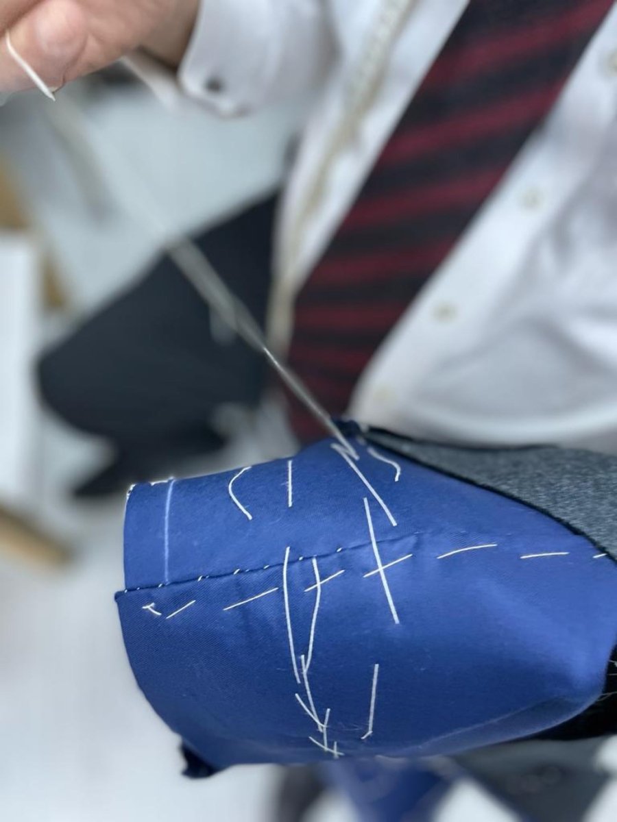 HIGHLIGHTING THE ARTISANAL NATURE OF OUR BESPOKE SUIT - GOODLUCK